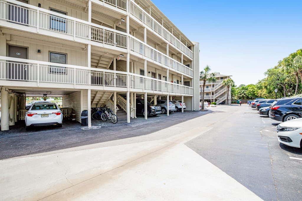 Condo with Coligny Beach views, outdoor pool, beach access, balcony, WD, & AC