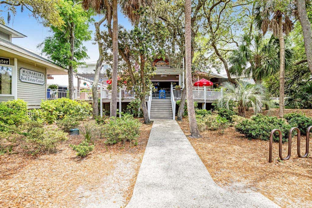 Condo with Coligny Beach views, outdoor pool, beach access, balcony, WD, & AC