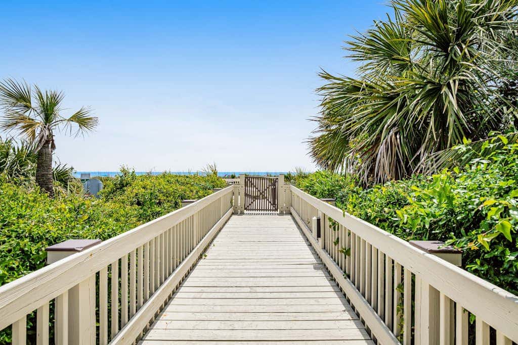 Condo with Coligny Beach views, outdoor pool, beach access, balcony, WD, & AC