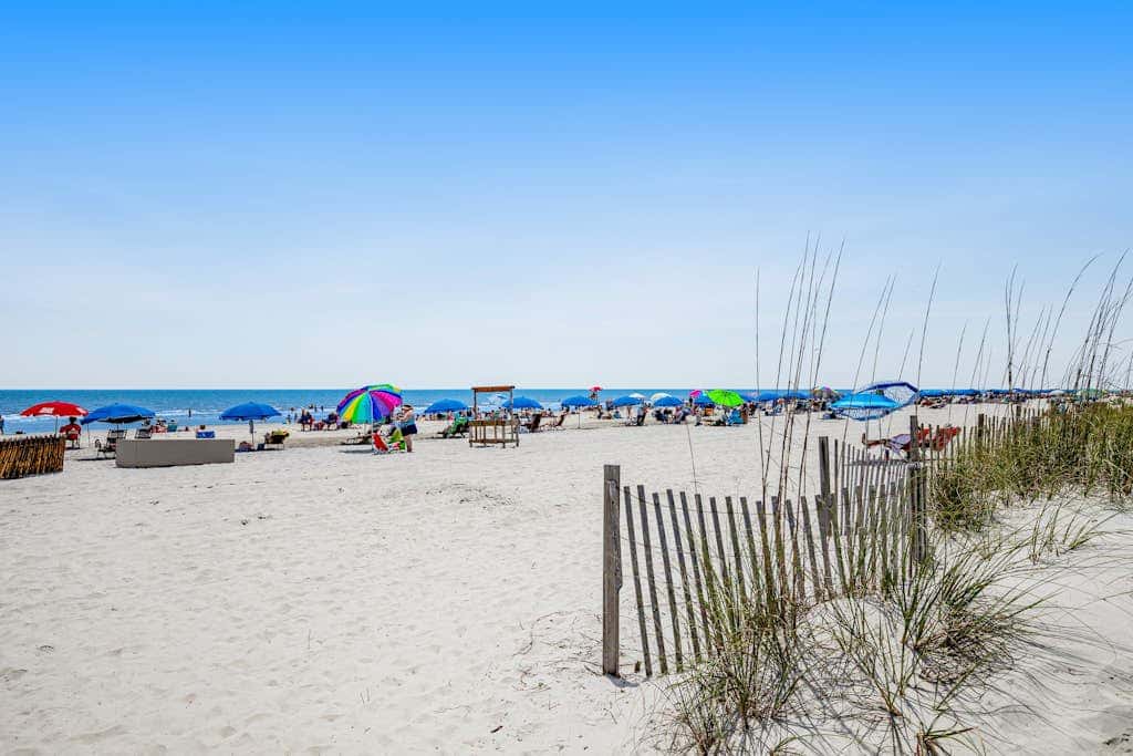 Condo with Coligny Beach views, outdoor pool, beach access, balcony, WD, & AC