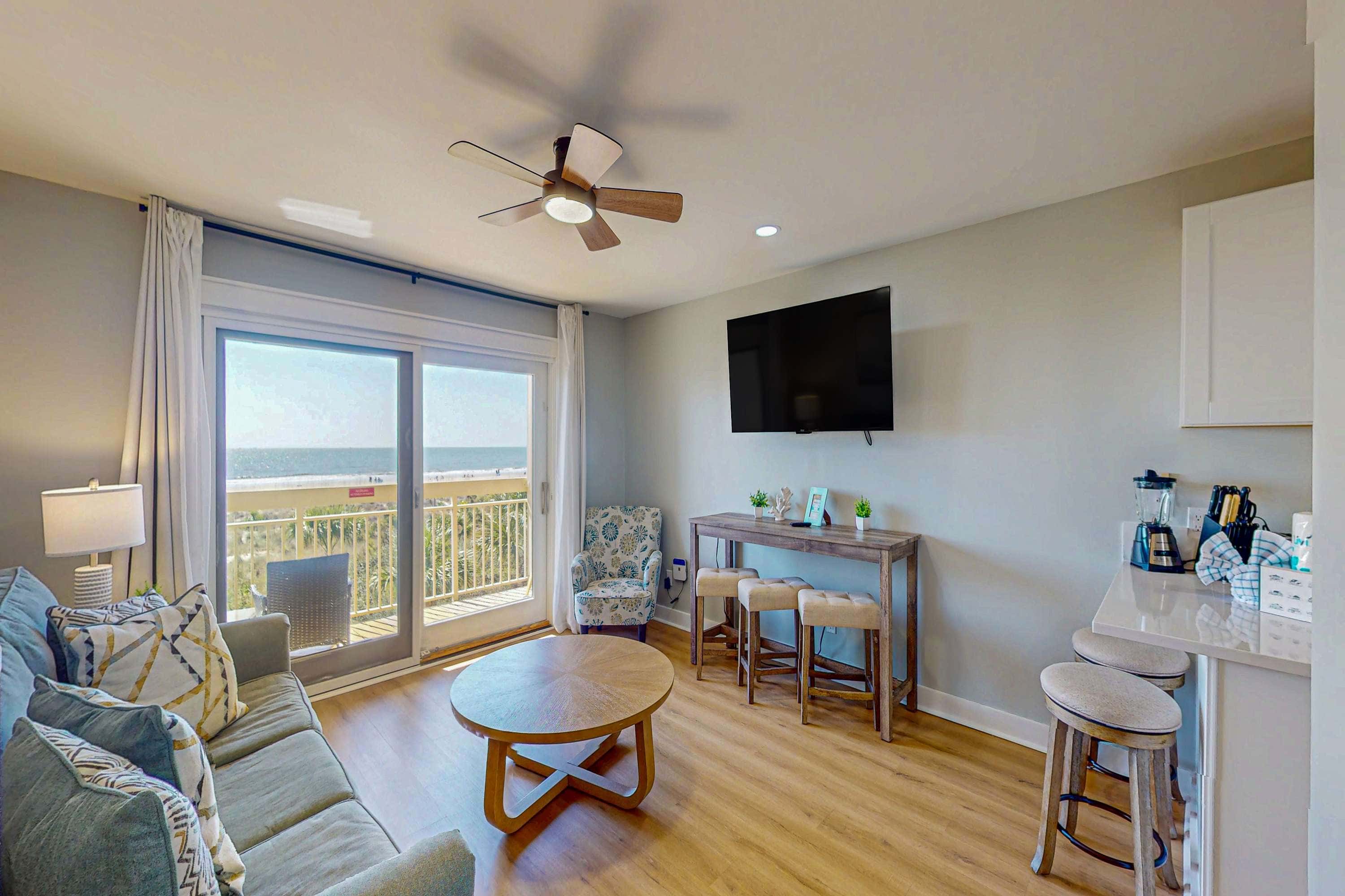 Condo with Coligny Beach views, outdoor pool, beach access, balcony, WD, & AC