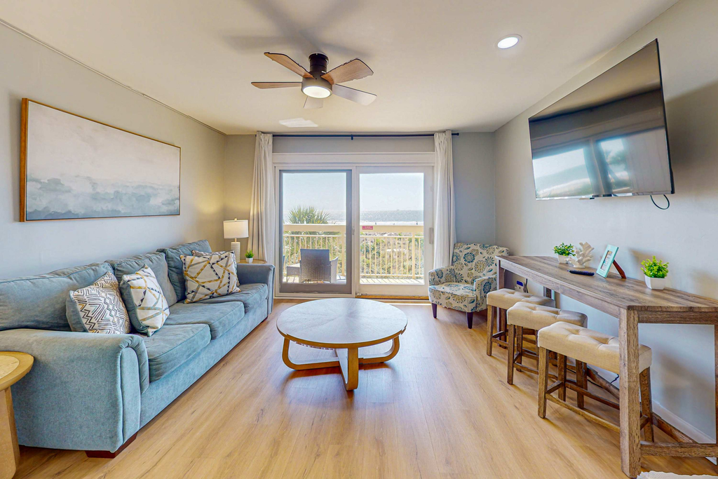 Condo with Coligny Beach views, outdoor pool, beach access, balcony, WD, & AC