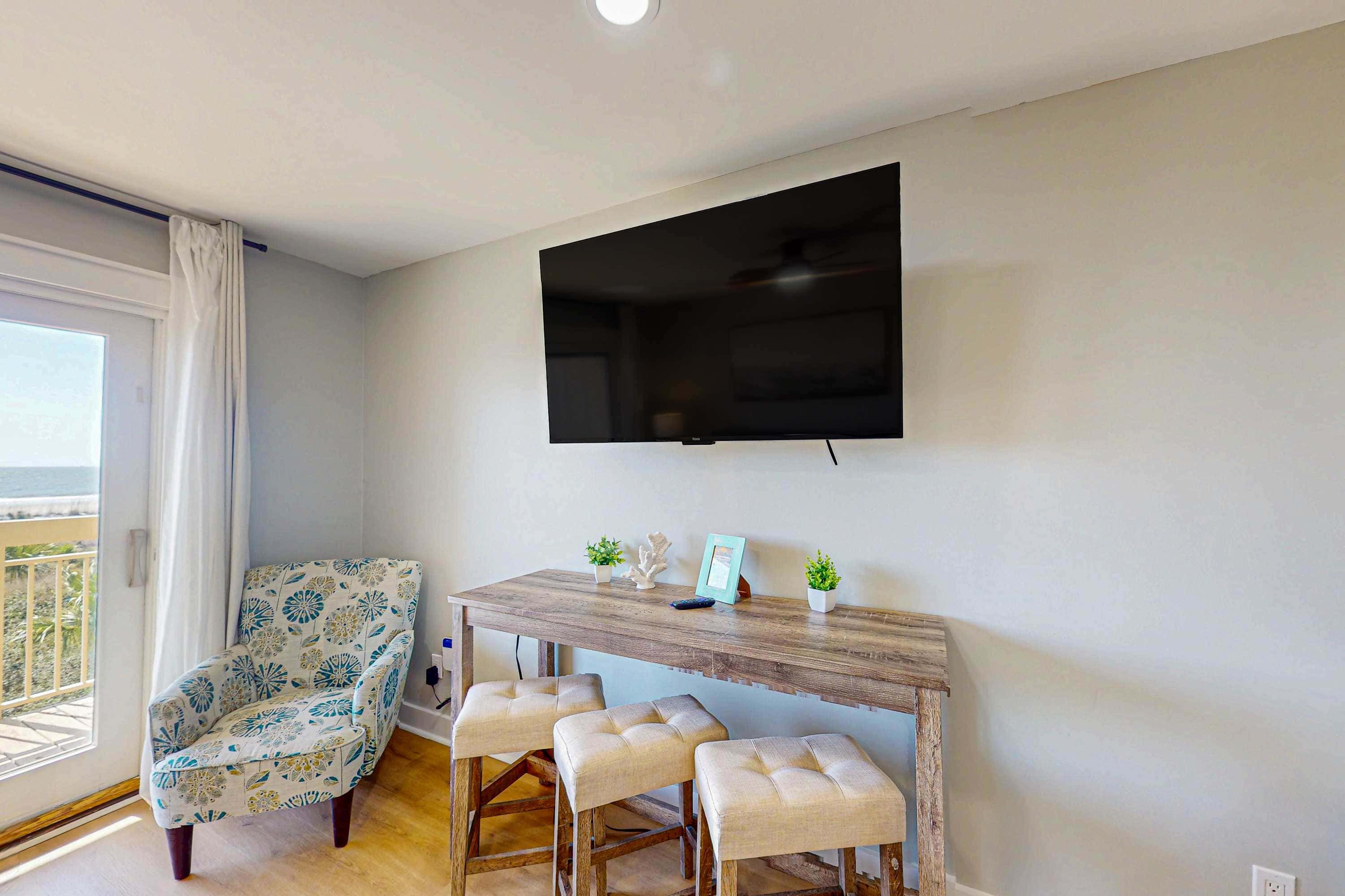 Condo with Coligny Beach views, outdoor pool, beach access, balcony, WD, & AC