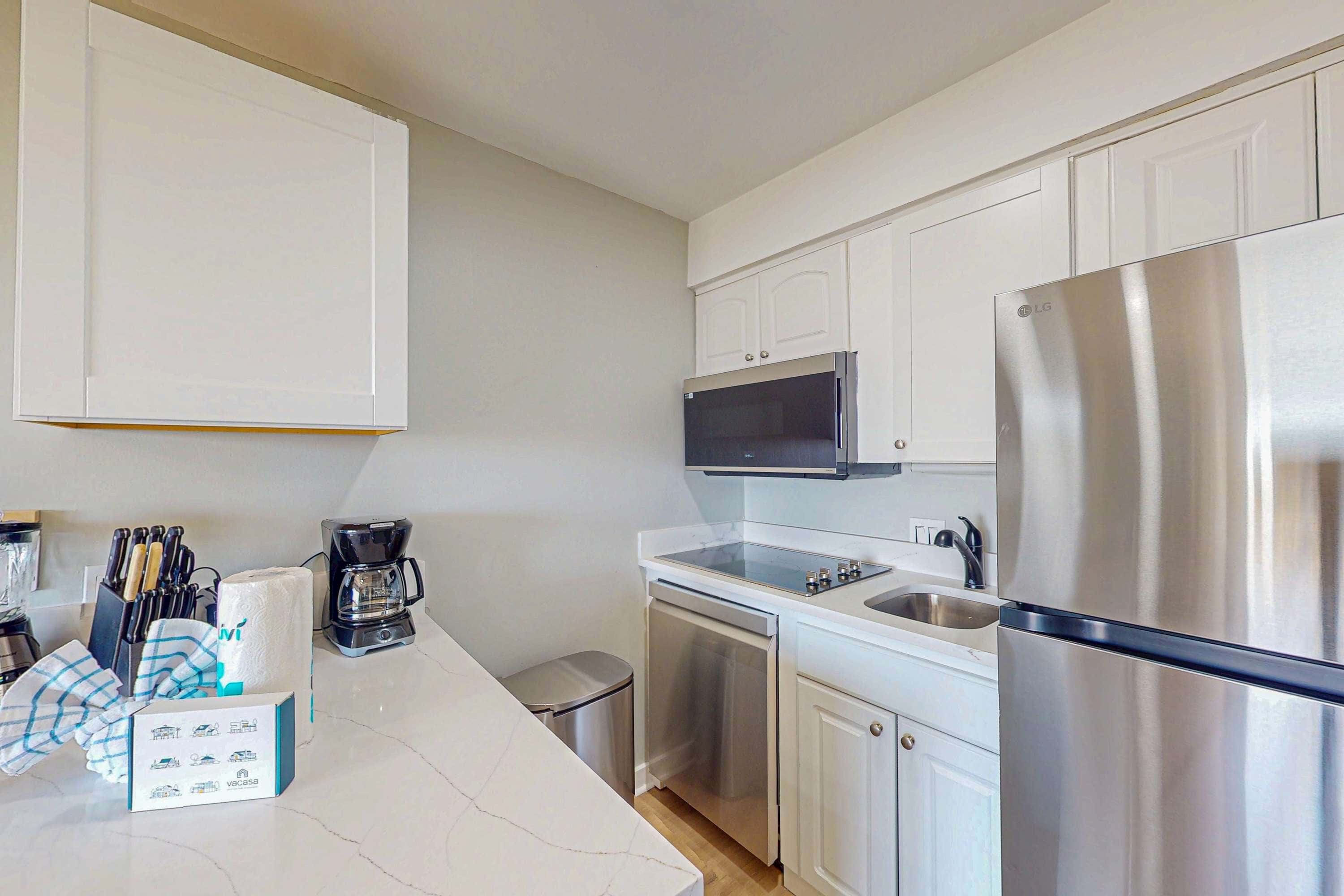 Condo with Coligny Beach views, outdoor pool, beach access, balcony, WD, & AC