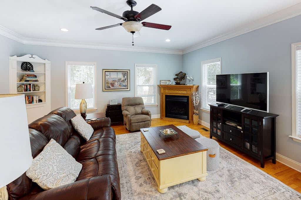 Sun-kissed home with AC, fireplace & W/D - short drive to the beach