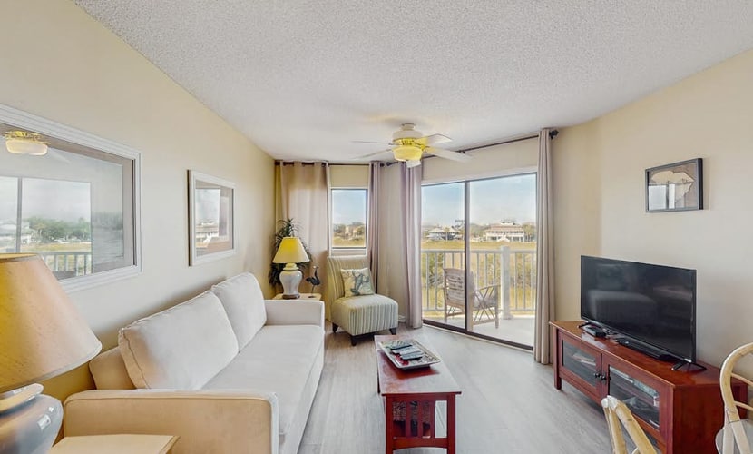 Second-Floor Condo w/Private Covered Balcony, Views, Free WiFi, and Shared Pool