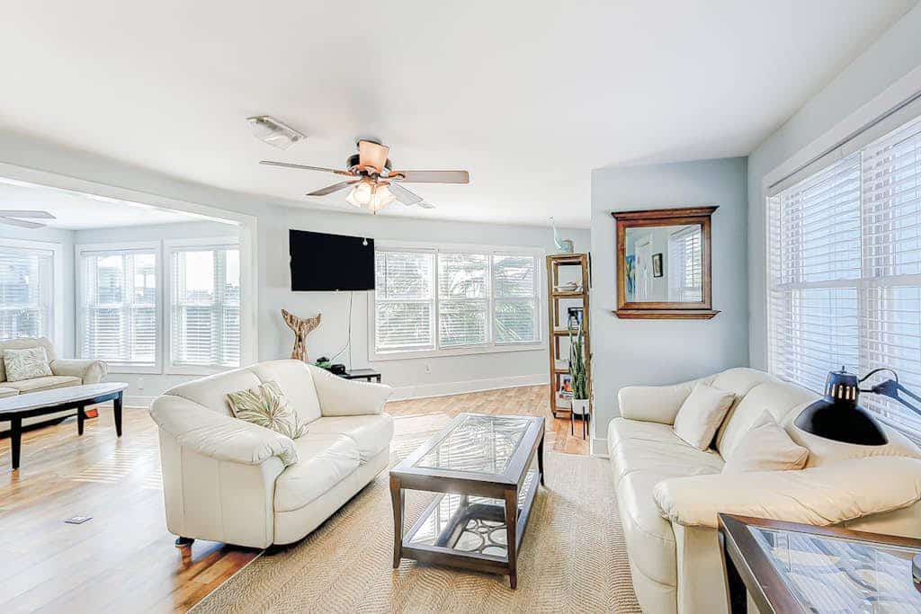 Sunny beach house with ocean view, large deck, central AC, & washer/dryer