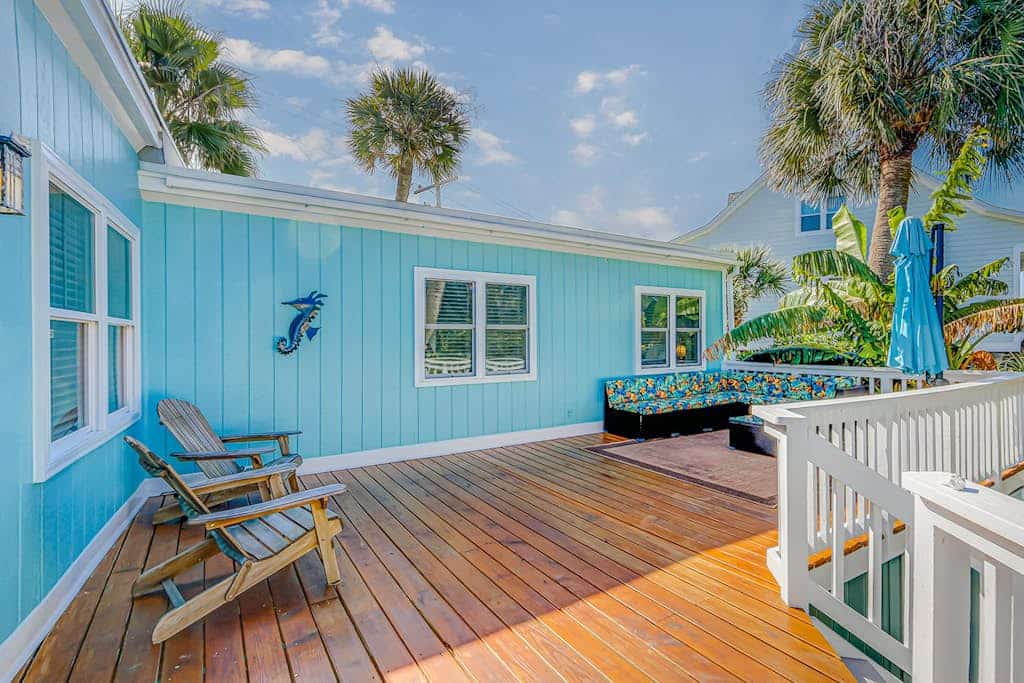 Sunny beach house with ocean view, large deck, central AC, & washer/dryer