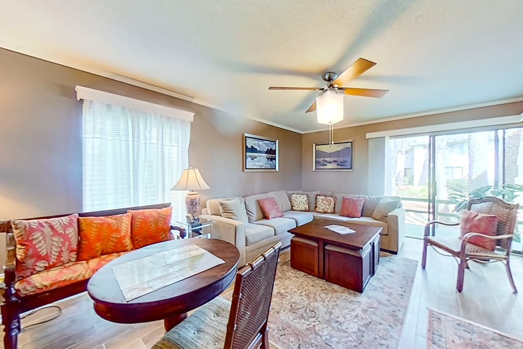 2 story condo with on-site pool, golf, tennis, private deck, AC, & WD