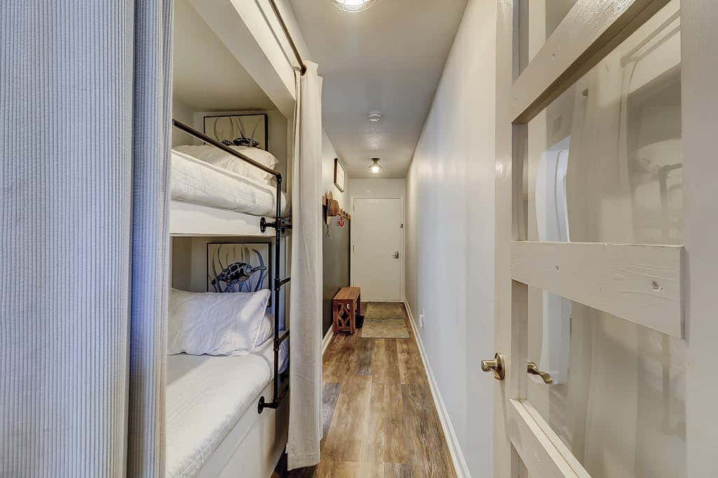 Second-floor condo in beachfront complex with pools, tennis & gym