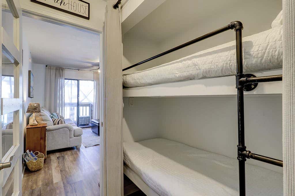 Second-floor condo in beachfront complex with pools, tennis & gym