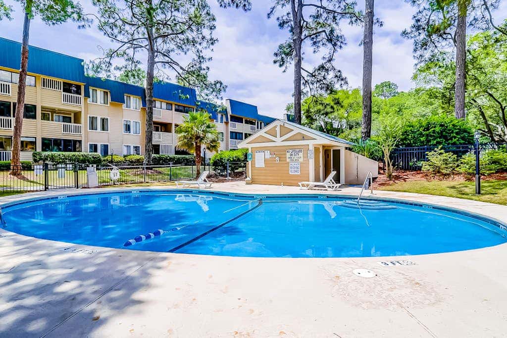 Second-floor condo in beachfront complex with pools, tennis & gym