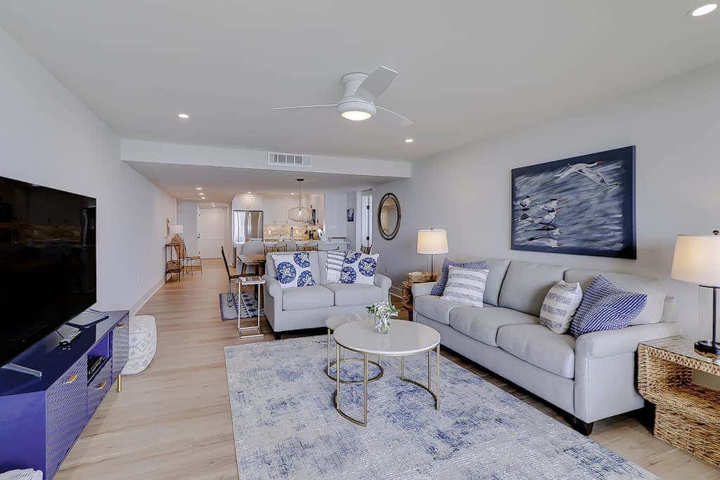 Beachfront escape with pools, hot tub, athletic courts, WD, and central AC