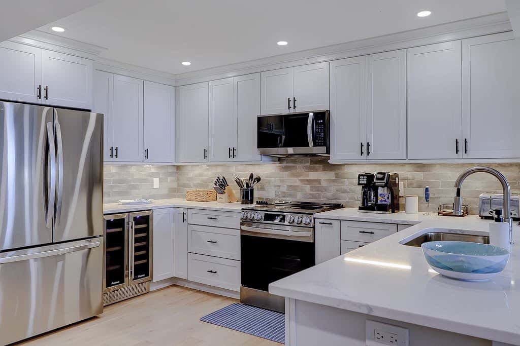 Beachfront escape with pools, hot tub, athletic courts, WD, and central AC