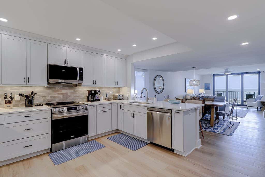 Beachfront escape with pools, hot tub, athletic courts, WD, and central AC