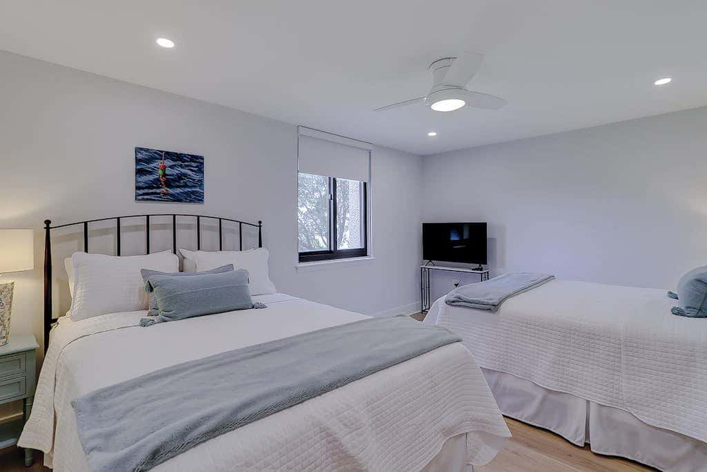 Beachfront escape with pools, hot tub, athletic courts, WD, and central AC