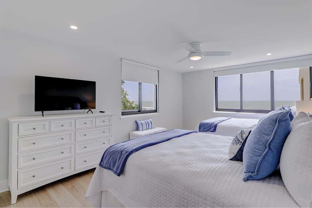 Beachfront escape with pools, hot tub, athletic courts, WD, and central AC