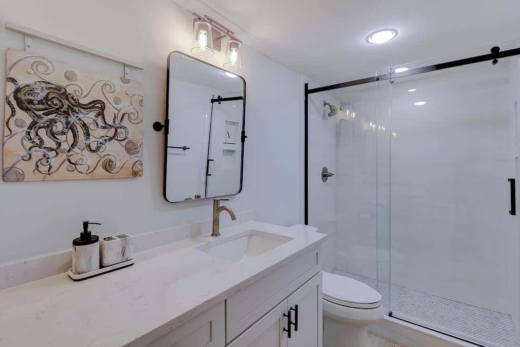 Beachfront escape with pools, hot tub, athletic courts, WD, and central AC