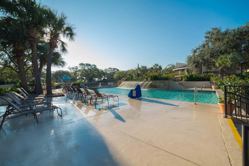 Beachfront escape with pools, hot tub, athletic courts, WD, and central AC