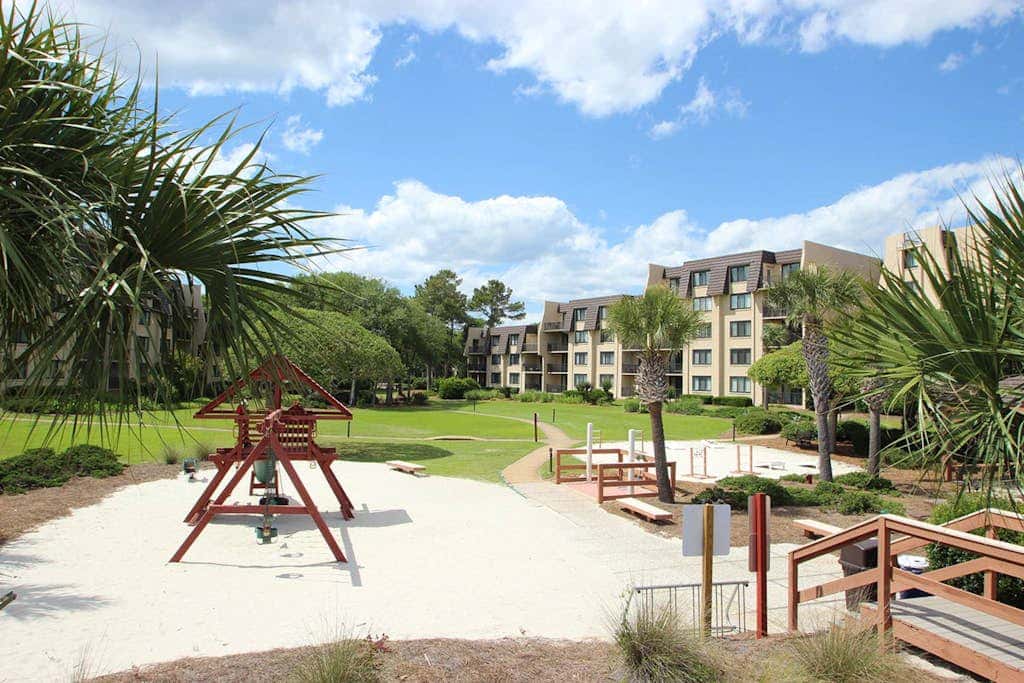 Beachfront escape with pools, hot tub, athletic courts, WD, and central AC