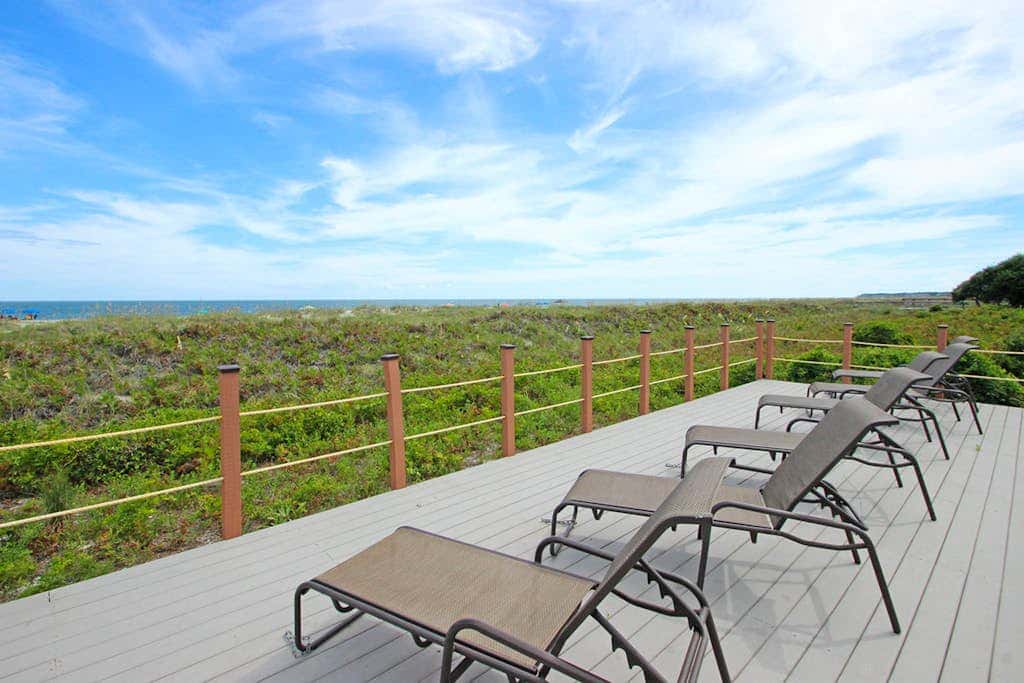 Beachfront escape with pools, hot tub, athletic courts, WD, and central AC