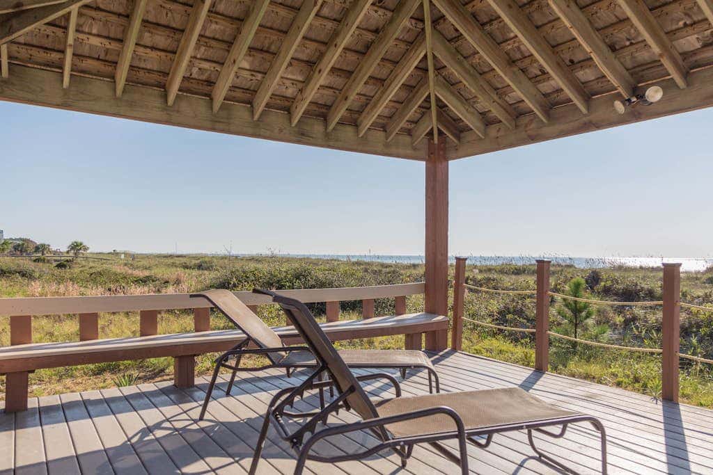 Beachfront escape with pools, hot tub, athletic courts, WD, and central AC