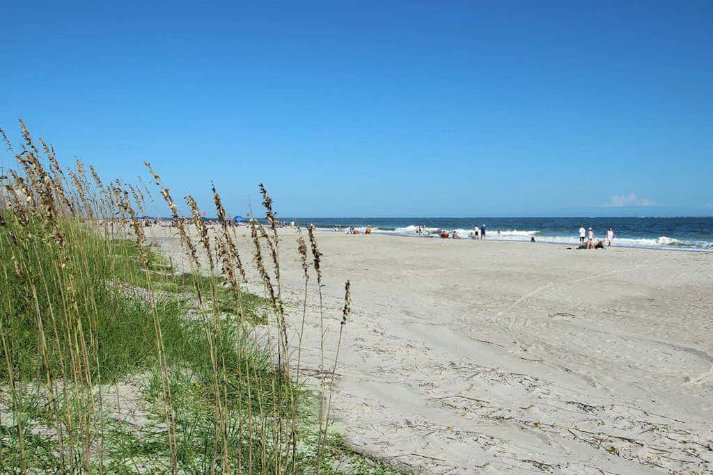 Beachfront escape with pools, hot tub, athletic courts, WD, and central AC