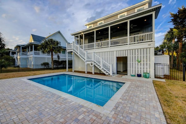 Custom home with private pool, elevator & short walk to the beach