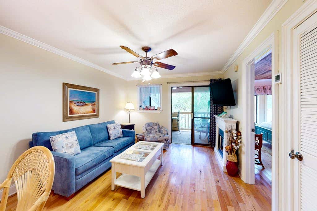 3rd-floor condo with water views, balcony, pools, gym, & beach access