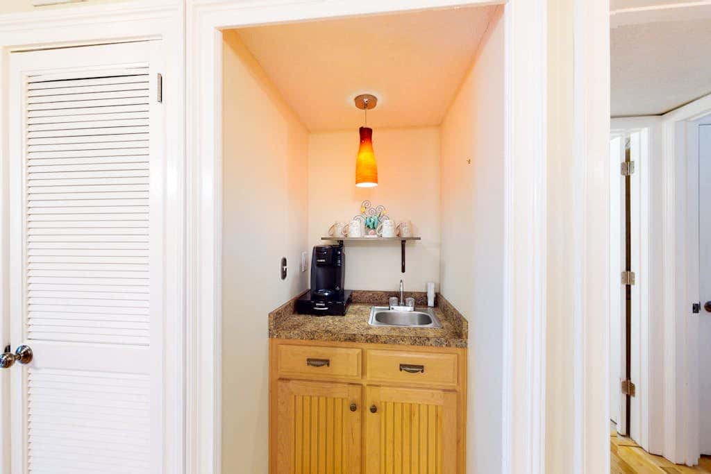 3rd-floor condo with water views, balcony, pools, gym, & beach access