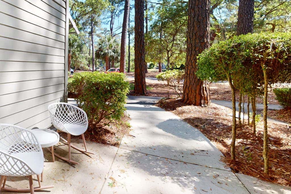 Golf course view condo with on site pool, tennis, & private patio