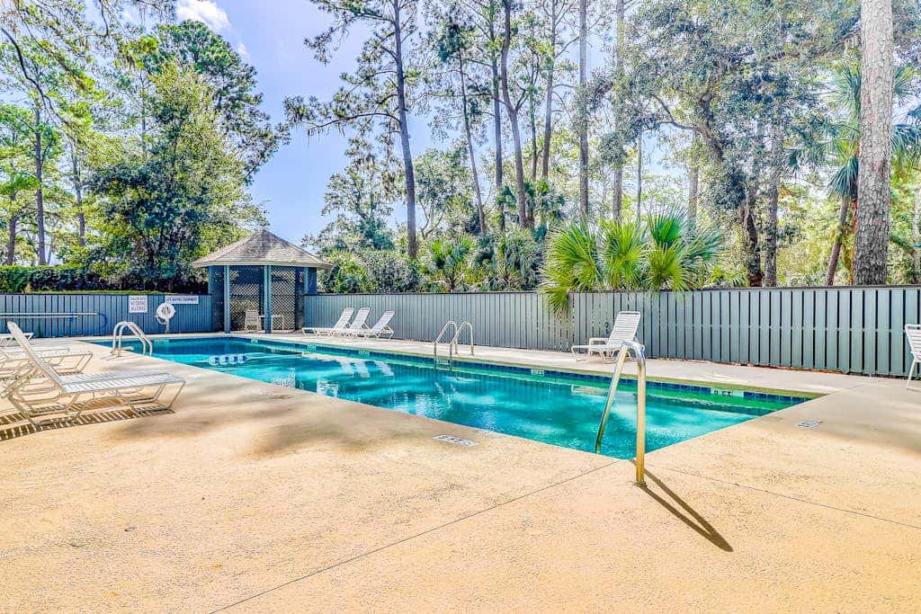 Golf course view condo with on site pool, tennis, & private patio