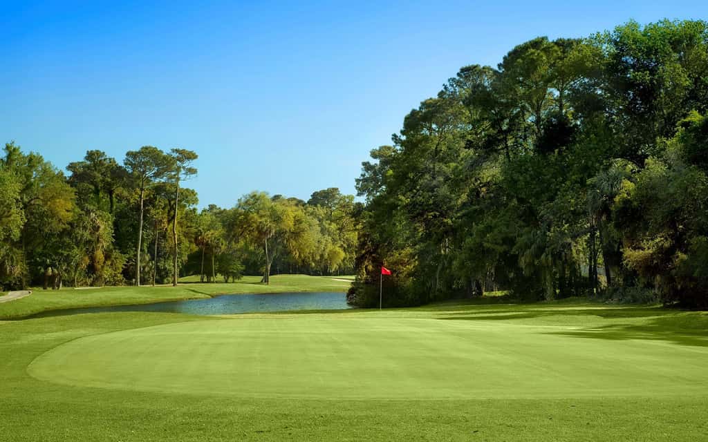 Golf course view condo with on site pool, tennis, & private patio