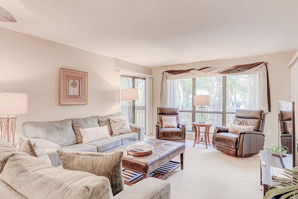 Dog friendly condo with pool, central AC, & washer and dryer, quick walk to beach