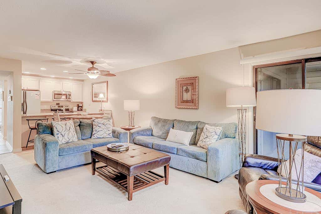 Dog friendly condo with pool, central AC, & washer and dryer, quick walk to beach