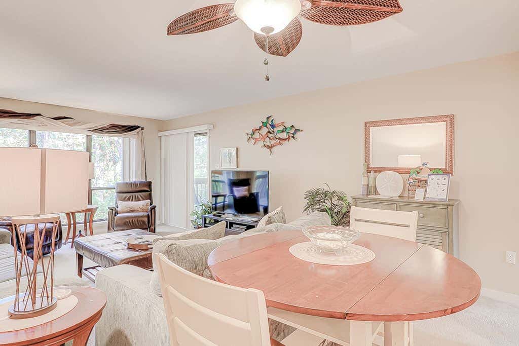 Dog friendly condo with pool, central AC, & washer and dryer, quick walk to beach