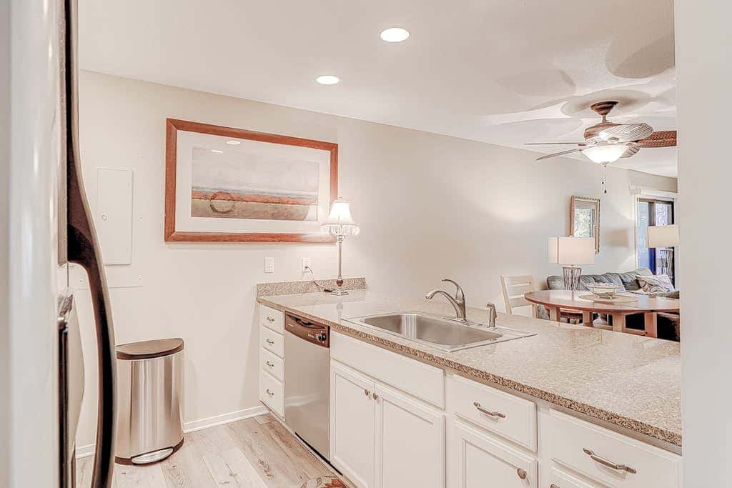 Dog friendly condo with pool, central AC, & washer and dryer, quick walk to beach