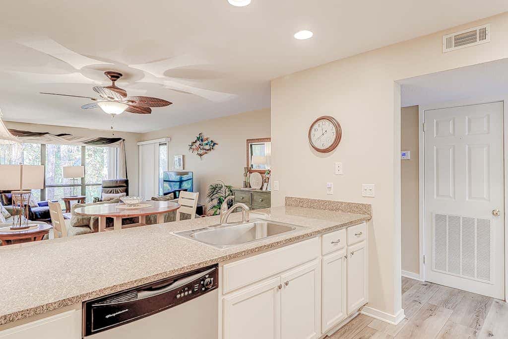 Dog friendly condo with pool, central AC, & washer and dryer, quick walk to beach