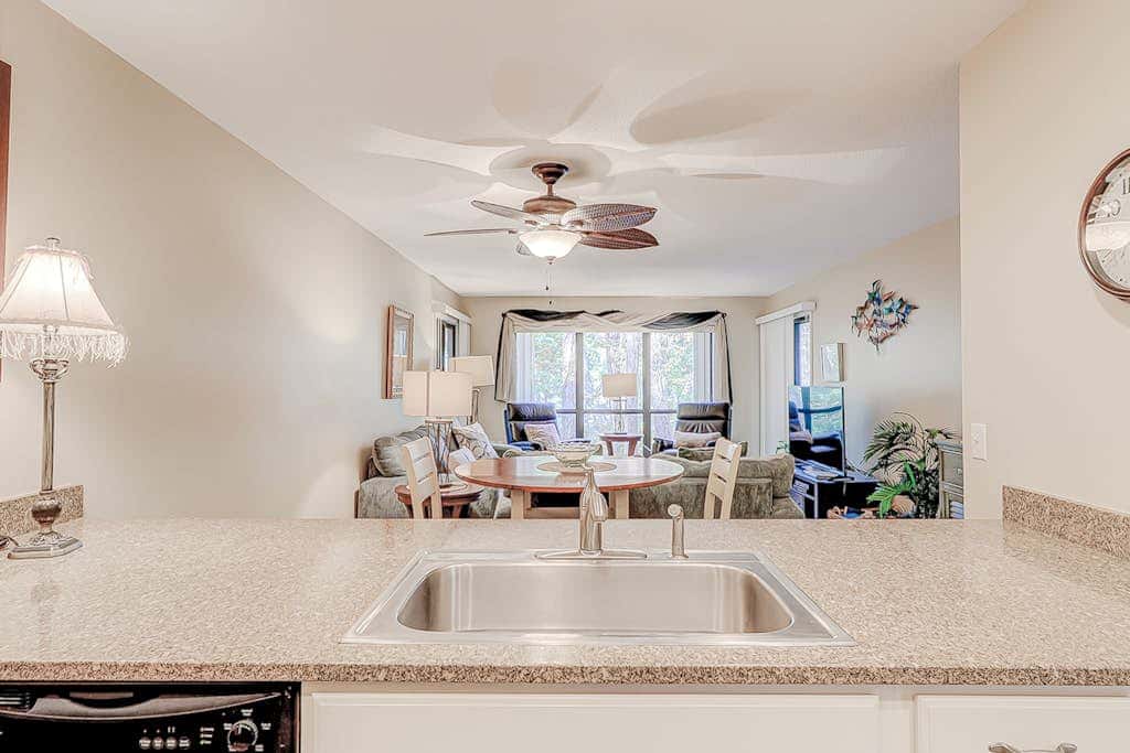 Dog friendly condo with pool, central AC, & washer and dryer, quick walk to beach