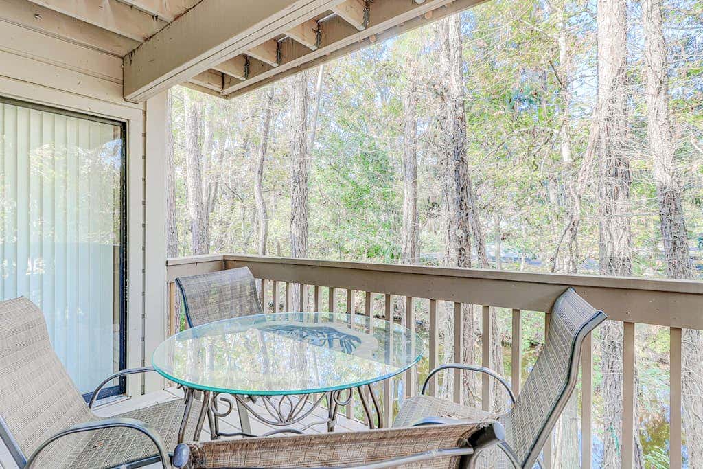 Dog friendly condo with pool, central AC, & washer and dryer, quick walk to beach