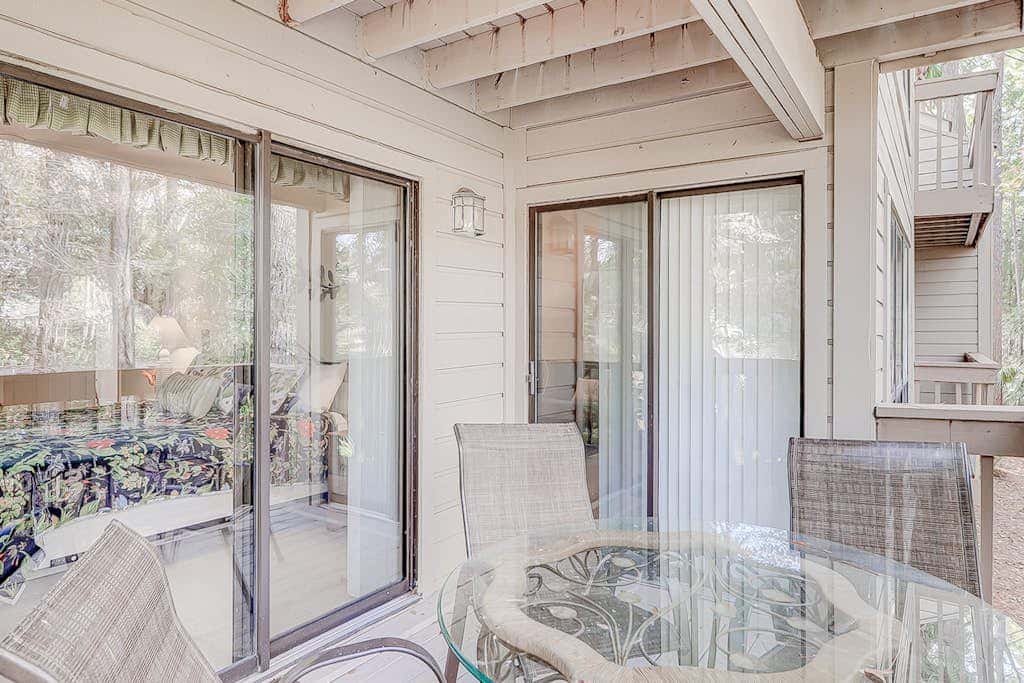 Dog friendly condo with pool, central AC, & washer and dryer, quick walk to beach