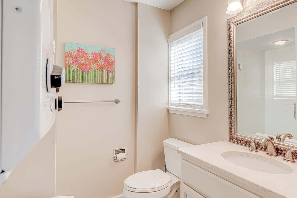 Dog friendly condo with pool, central AC, & washer and dryer, quick walk to beach