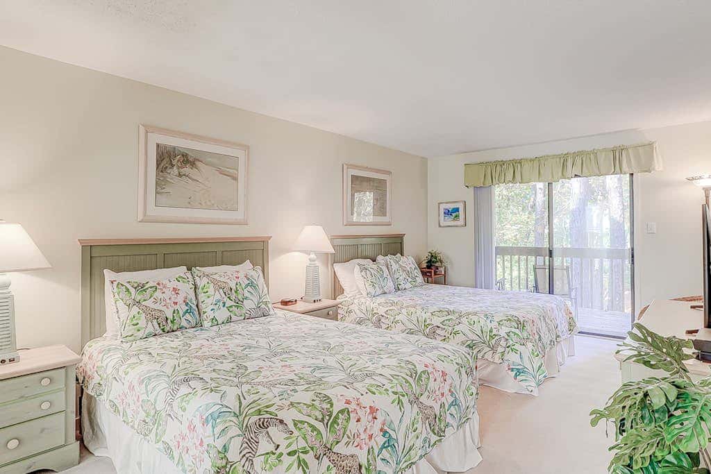 Dog friendly condo with pool, central AC, & washer and dryer, quick walk to beach