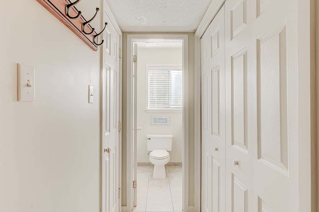 Dog friendly condo with pool, central AC, & washer and dryer, quick walk to beach