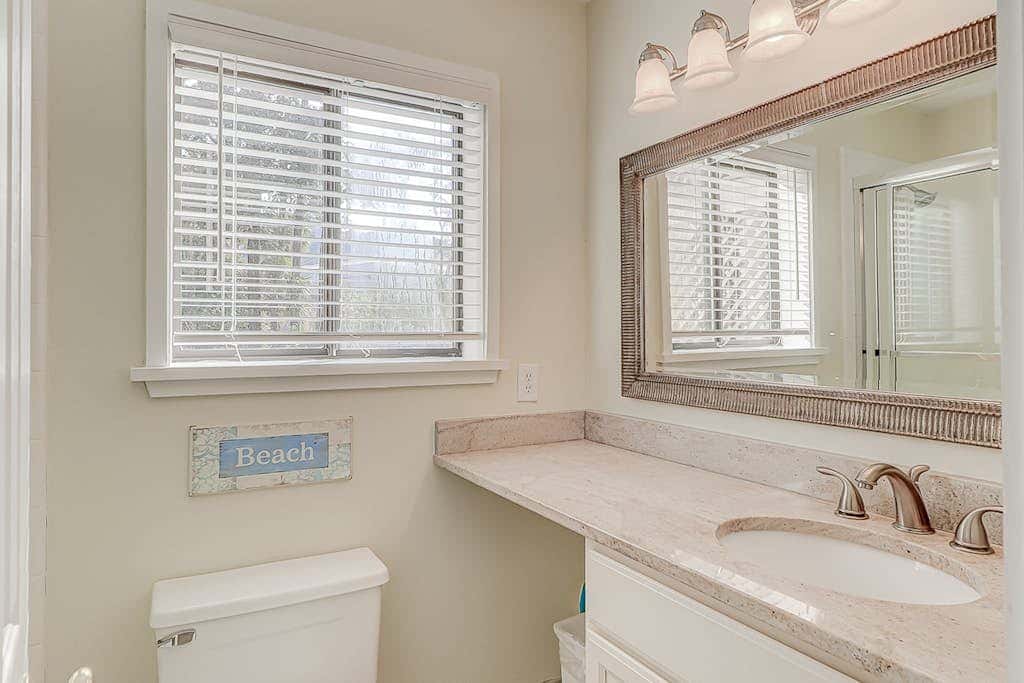 Dog friendly condo with pool, central AC, & washer and dryer, quick walk to beach