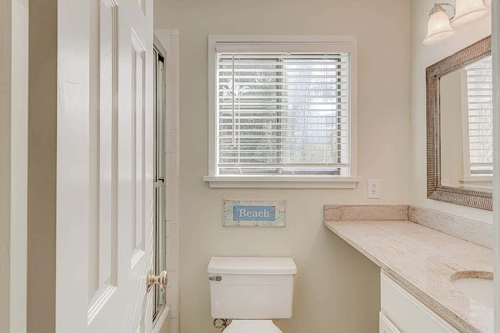 Dog friendly condo with pool, central AC, & washer and dryer, quick walk to beach