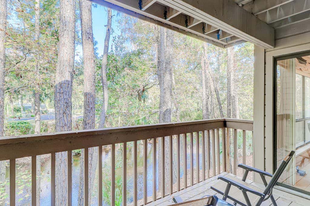 Dog friendly condo with pool, central AC, & washer and dryer, quick walk to beach