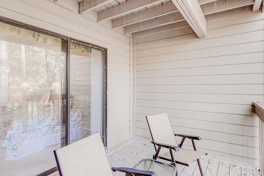 Dog friendly condo with pool, central AC, & washer and dryer, quick walk to beach