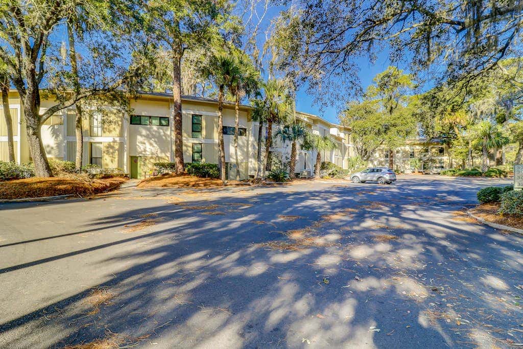 Beach access condo with deck, pool, washer dryer, and AC - snowbird-friendly
