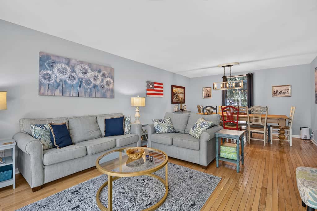 Beach access condo with deck, pool, washer dryer, and AC - snowbird-friendly